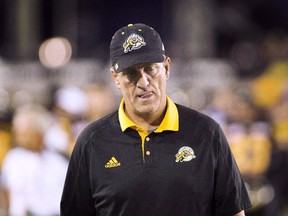 Hamilton Tiger-Cats head coach Kent Austin walks off the field following his team's loss to the Winnipeg Blue Bombers in CFL action in Hamilton on July 7, 2016. (THE CANADIAN PRESS/Peter Power)