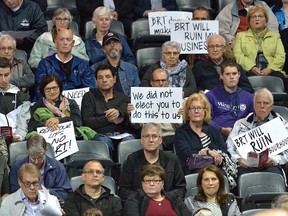 Londoners with signs at the public input meeting for the BRT at Budweiser Gardens on Wednesday May 3, 2107 MORRIS LAMONT/THE LONDON FREE PRESS /POSTMEDIA NETWORK