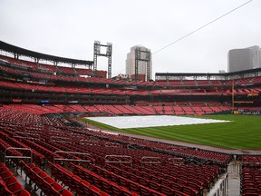 A general view of the rain tarp on the field at Busch Stadium as the game between the St. Louis Cardinals and the Milwaukee Brewers is postponed due to rain on May 3, 2017. (Dilip Vishwanat/Getty Images)