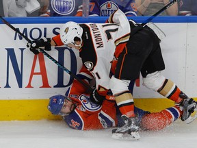 Edmonton Oilers forward Jordan Eberle is checked by Anaheim Ducks' Brandon Montour in the fourth game of their second-round playoff series in Edmonton on Wednesday, May 3, 2017. (Larry Wong)