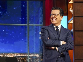 In this Feb. 22, 2017 photo released by CBS, host Stephen Colbert appears on the set of "The Late Show with Stephen Colbert," in New York. Colbert will reunite with his former Comedy Central cast members Jon Stewart, Samantha Bee, John Oliver, Ed Helms and Rob Corddry for a special episode airing Tuesday, May 9. (Gail Schulman/CBS via AP)