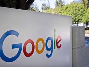 This Oct. 20, 2015, file photo, shows a sign outside Google headquarters in Mountain View, Calif. Google is warning users Wednesday, May 3, 2017, to beware of a phishing scam spread by a fraudulent invitation to share a Google Doc. (AP Photo/Marcio Jose Sanchez, File)