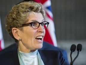 Ontario Premier Kathleen Wynne’s cap and trade plan doesn’t have any of the three conditions necessary for government carbon pricing schemes to lower industrial greenhouse gas emissions linked to climate change efficiently, according to a new Fraser Institute report. (TORONTO SUN/FILES)