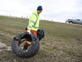 City of Grande Prairie crew member Kyle Reynolds got a head start on City Scrub by picking up litter along Highway 43 on Wednesday in Grande Prairie. The city will hold its annual City Scrub May 5 to 14. 
Svjetlana Mlinarevic/Daily Herald-Tribune