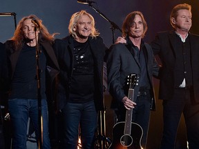 (L-R) Musicians Bernie Leadon, Timothy B. Schmit, Joe Walsh, Jackson Browne and Don Henley, honouring Eagles founder Glenn Frey, appear onstage during The 58th Grammy Awards at Staples Center on Feb. 15, 2016 in Los Angeles.  (Photo by Kevork Djansezian/Getty Images)