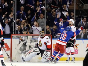 Ottawa Senators goalie Craig Anderson and New York Rangers' Jesper Fast react after Nick Holden scores during Game 4 on May 4, 2017. (AP Photo/Frank Franklin II)