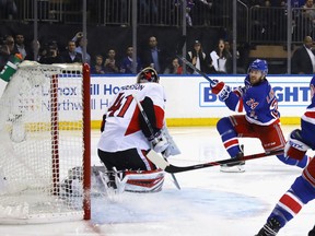 Rangers’ Oscar Lindberg scores one of his two goals during last night’s Game 4 win over the Senators. (GETTY IMAGES)