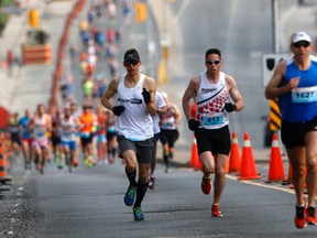 Runners participate in the Goodlife Marathon on Yonge St. near York Mills in 2015. (Michael Peake/Toronto Sun)