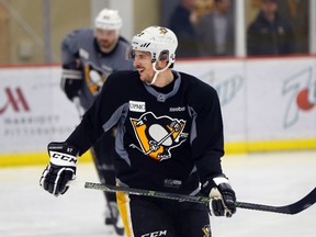 Penguins captain Sidney Crosby smiles during practice at the team's practice facility in Cranberry, Pa., on Friday, May 5, 2017. It was Crosby's first time back on the ice since he suffered a concussion earlier this week. (Keith Srakocic/AP Photo)