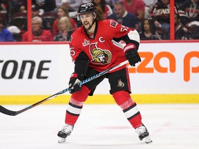 Senators defenceman Erik karlsson missed the third period of Game 4 against the Rangers with a foot injury. (Wayne Cuddington/Postmedia)