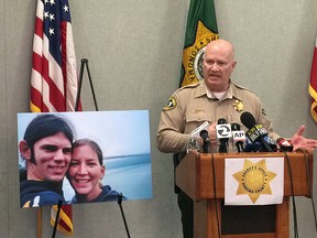 Sonoma County Sheriff Steve Freitas speaks next to a photo of Jason Allen, left, and Lindsay Cutshall at a news conference in Santa Rosa, Calif., Friday, May 5, 2017. (AP Photo/Terry Chea)