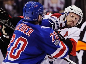 Rangers' Chris Kreider (left) and Senators' Dion Phaneuf (right) fight during the second period of Game 4 in New York on Thursday, May 4, 2017. (Frank Franklin II/AP Photo)
