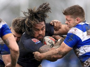 Toronto Wolfpack’s Fuifui Moimoi runs the ball against Siddal during their Ladbrokes Challenge Cup match in England in late February. (The Canadian Press)