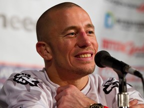 Georges St. Pierre is offering to fight Michael Bisping sometime in the fall. (Ian Kucerak/Postmedia Network/Files)