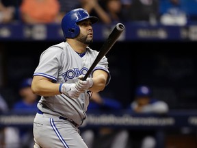 Blue Jays' Kendrys Morales watches his three-run home run off Rays relief pitcher Jumbo Diaz during eighth inning MLB action in St. Petersburg, Fla., on Friday, May 5, 2017. (Chris O'Meara/AP Photo)