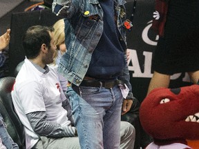 Tragically Hip front man Gord Downie waves to the crowd during the Raptors playoff game against the Cleveland Cavaliers at the Air Canada Centre in Toronto Friday May 5, 2017. (Ernest Doroszuk/Toronto Sun)