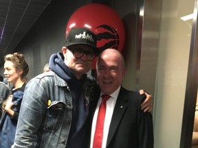 Tragically Hip's Gord Downie was greeted as family by MLSE Chairman Larry Tanenbaum after the Toronto Raptors lost Game 3 to the Cleveland Cavaliers. (Joe Warmington/Toronto Sun)