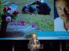 Stan Behal of the Toronto Sun accepts the award for news photo at the 2016 National Newspaper Awards in Toronto, Friday, May 5, 2017. THE CANADIAN PRESS/Galit Rodan