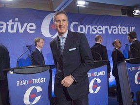 Maxime Bernier leaves the Conservative leadership candidates' bilingual debate in Moncton, N.B. on Tuesday, Dec. 6, 2016. (THE CANADIAN PRESS/Andrew Vaughan)