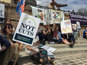 Union representatives from around Manitoba gathered together Saturday at a "Communities, Not Cuts" rally at The Forks to protest the austerity measures of the Pallister government. (David Larkins/Winnipeg Sun)