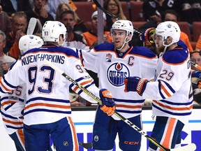 Connor McDavid #97 of the Edmonton Oilers celebrates his power play goal with Mark Letestu #55, Ryan Nugent-Hopkins #93 and Leon Draisaitl #29 to take a 2-0 lead over the Anaheim Ducks during the second period in Game Five of the Western Conference Second Round during the 2017 NHL Stanley Cup Playoffs at Honda Center on May 5, 2017 in Anaheim, California.