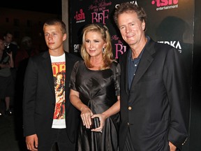 In this Sept. 30, 2008, file photo, Conrad Hilton, left, Kathy Hilton, centre, and Rick Hilton arrive at the launch party of new MTV series "Paris Hilton's My New BFF" in Los Angeles. Paris Hilton's younger brother, Conrad Hilton, has been arrested in Los Angeles for allegedly stealing a car and violating an ex-girlfriend's restraining order. Police say the 23-year-old Hilton Hotel heir was arrested shortly before 5 a.m. Saturday, May 6, 2017, at a home in the Hollywood Hills. (AP Photo/Matt Sayles, File)