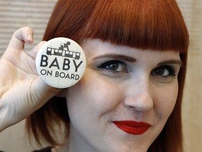 Breton Kennedy who is five months' pregnant implored Torontonians online to create a button that will enable her and other pregnant women to get a seat on the TTC. She hopes the TTC will come on board, on Friday May 5, 2017. (Michael Peake/Toronto Sun)