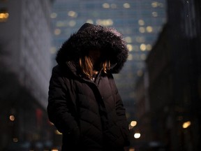 A former fentanyl user named Christie poses for a portrait in Toronto. At 13, Christie was smoking pot daily. In time, she began dabbling in cocaine. But it wasn't until she was prescribed Percocet by her dentist following wisdom teeth removal in her early 20s that she began the long spiral downwards into a full-fledged opioid addiction that took over her life. THE CANADIAN PRESS/Chris Young