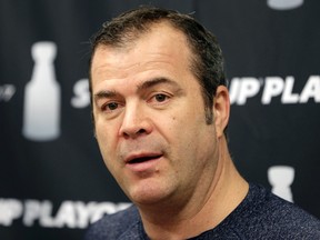 Rangers head coach Alain Vigneault talks to reporters after practice in Tarrytown, N.Y., on April 25, 2017. (Seth Wenig/AP Photo)