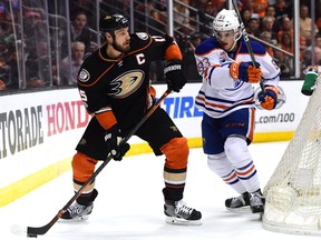 Ryan Getzlaf #15 of the Anaheim Ducks looks to pass in front of Matthew Benning #83 of the Edmonton Oilers during the first period in Game Five of the Western Conference Second Round during the 2017 NHL Stanley Cup Playoffs at Honda Center on May 5, 2017 in Anaheim, California.