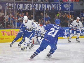 Centre Sergey Kalinin (15) takes a puck to the gut during the Toronto Marlies’ loss to the Crunch in Syracuse on Saturday night. (Scott Thomas Photography)