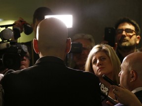 Ontario Transportation Minister Steven Del Duca speaks to media outside the mayor's office following a meeting between PC Leader Patrick Brown and Mayor John Tory in Toronto on Monday, May 1, 2017. (Michael Peake/Toronto Sun)