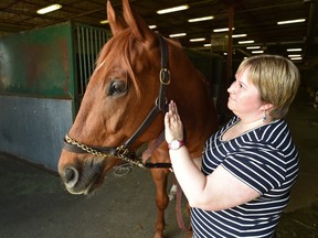 Shannon Honey is a member of the Alberta Thoroughbred Race Club which two year old thoroughbred Roide Tigre is a part of at the Northlands Race Track in Edmonton, May 5, 2017. (Ed Kaiser/Postmedia)