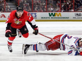 Jean-Gabriel Pageau of the Ottawa Senators trips over a falling Brendan Smith of the New York Rangers during Game 5 of the Eastern Conference semifinal at the Canadian Tire Centre on May 6, 2017 in Ottawa. (Jana Chytilova/Freestyle Photography/Getty Images)