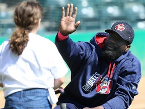 Winnipeg Goldeyes slugger Reggie Abercrombie helps out during the Mikey O'Brien and Diabetes Canada Skills Camp for Kids at Shaw Park in Winnipeg on Sun., May 7, 2017. Kevin King/Winnipeg Sun/Postmedia Network