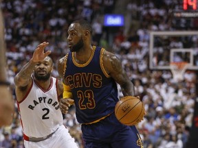 While this play may be an exception, Raptors forward P.J. Tucker did a decent job defending against Cleveland Cavaliers superstar LeBron James during Game 4 yesterday at the ACC. (JACK BOLAND/Toronto Sun)