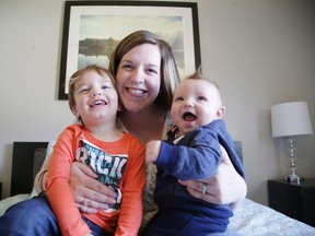 Meg "The Blissful Doula" Kant with her children, two-year-old Gibson and four-month-old Miller. Gino Donato/Sudbury Star