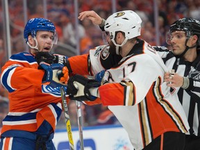 Connor McDavid of the Edmonton Oilers takes a shot from Ryan Kesler of the Anaheim Duck in Game 6 of their second-round playoff series at Rogers Place on May 7, 2017. (Shaughn Butts)