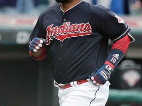 Cleveland Indians' Edwin Encarnacion runs the bases after hitting a solo home run off Houston Astros starting pitcher Mike Fiers during the second inning of a baseball game, Thursday, April 27, 2017, in Cleveland. (AP Photo/Tony Dejak)