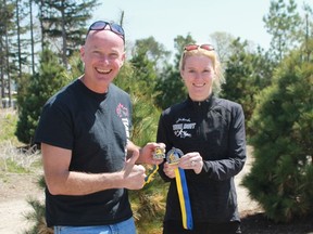 Wes Harding and his sister Chantelle Peters show off the medals they received after competing in the 2017 Boston Marathon on April 17.
CARL HNATYSHYN/SARNIA THIS WEEK