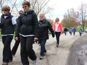 Hikers Mary Anne Van Bakel (left), Leanne Jackson, Colleen Appleby and Lee Ann Rocher take off for a 4-kilometre trek around Mitchell's Lions Park in the community's first Hike for Hospice last Sunday, May 7. The fundraiser drew close to 50 people. MEGAN STACEY/POSTMEDIA NEWS