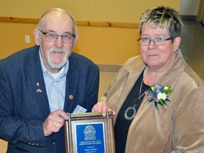 Nancy Ellens was presented with a plaque recognizing her selection as the Rotary Club of Mitchell’s 2016 Citizen of the Year from Rotary President Dave Williams during the banquet in her honour last Friday, May 5 at the Royal Canadian Legion, Mitchell. ANDY BADER/MITCHELL ADVOCATE