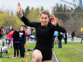 Lindsay Harmer leaps to a second place finish in the senior girls triple jump. SERENA HINZ SUBMITTED PHOTO
