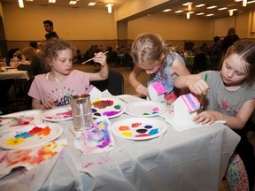 A group of girls enjoy an art activity at the fifth annual Mental Health Art Gala at the Vermilion Regional Centre on Tuesday, May 2, 2017, in Vermilion, Alta. Taylor Hermiston/Vermilion Standard/Postmedia Network.