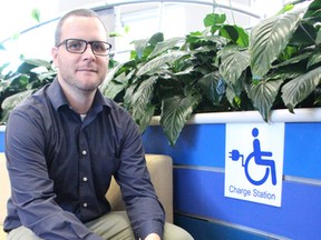 City accessibility coordinator Dale Mosley is pictured here at a mobility device charging station at Sarnia city hall Monday. The City of Sarnia is starting to offer grants to local businesses interested in participating in the Charge n' Go initiative, a city-run effort to designate outlets across the community specifically for people to recharge electric wheelchairs and mobility scooters. (Barbara Simpson/Sarnia Observer)