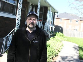 Doug Surette worries about how moving his family will affect his daughters with autism after his family was recently served an eviction notice at their rental to make room for a parking lot - for a proposed new medical clinic. Surette and his landlord disagree on the terms of his lease. (Tyler Kula/Sarnia Observer)