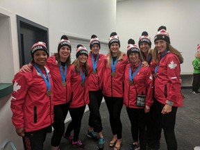 The Canadian Ballers proudly display their World Masters Games basketball gold medals in the 30-to-35 age group. (Special to The Free Press)