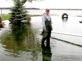 BRUCE BELL/STAFF REPORTER
Ken Hasen, along with family mebers and neighbours is busy trying trying to stop the Bay of Quinte waters from engulfing the familyâÄôs Sunrise Drive cottage. The surging  water has started to flood basements and homes in the Ameliasburgh neighbourhood.