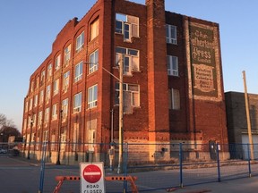 The sun sets in the Sutherland Press building in downtown St. Thomas. (Times-Journal file photo)