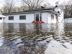 A flooded house along Bayview Road in Constance Bay. ERROL MCGIHON / POSTMEDIA